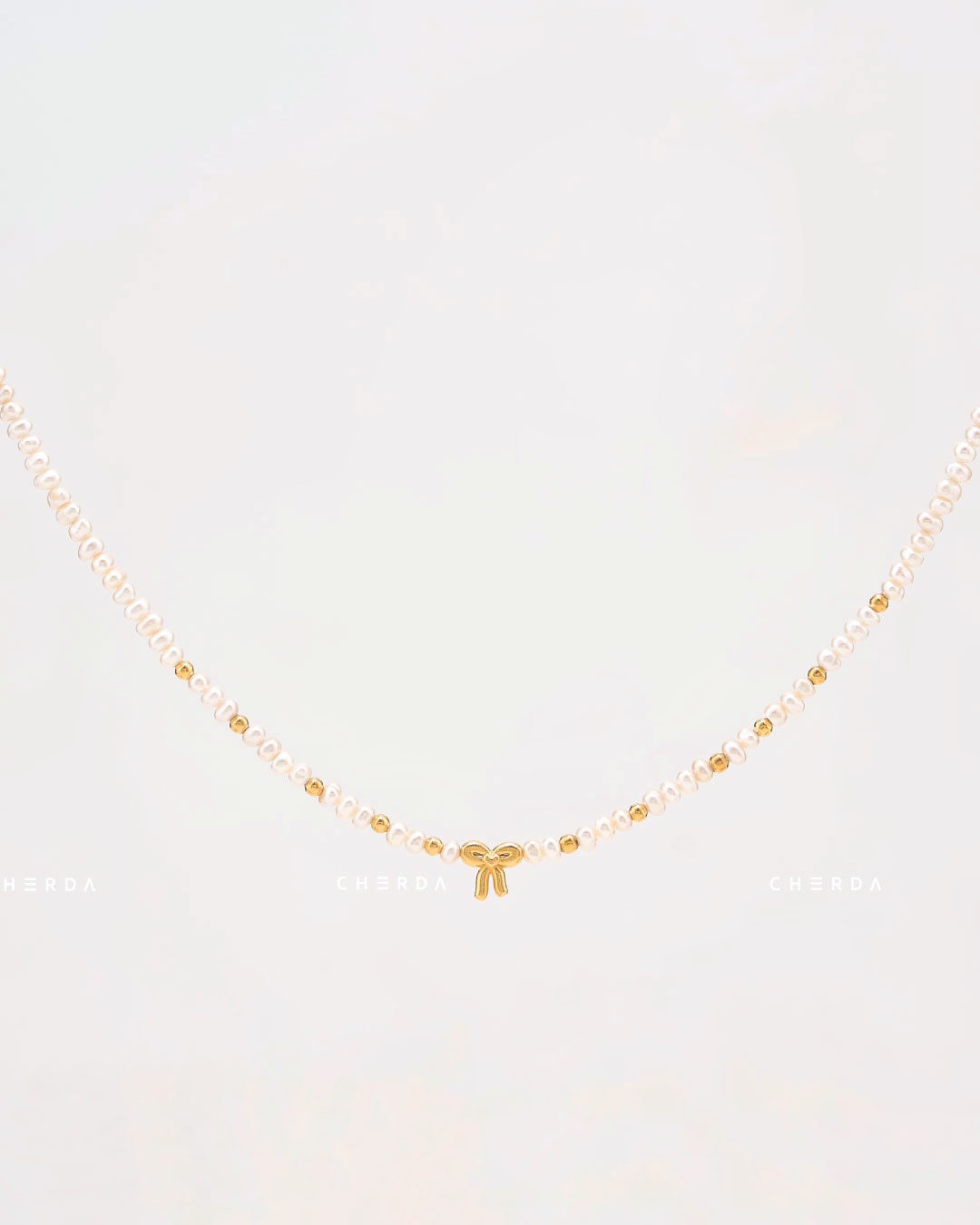 LOOPY BOWIE PEARL NECKLACE